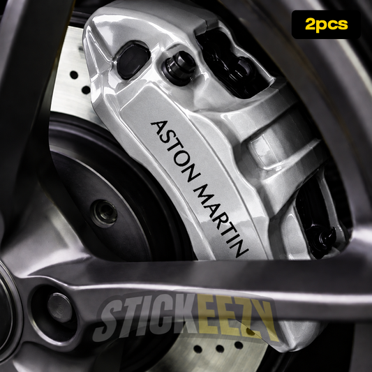 Aston Martin lettering decals for refinished brake calipers and custom luxury performance wheel setups