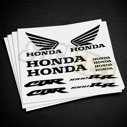 Sheet of Honda decals including logos and model names on a black background