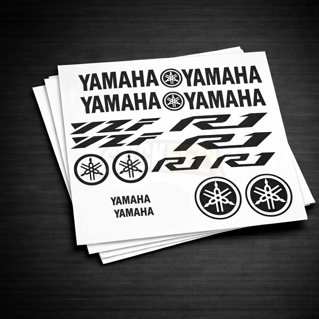 Sheet of Yamaha YZF R-1 decals on a dark surface