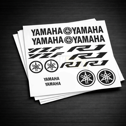 Sheet of Yamaha YZF R-1 decals on a dark surface